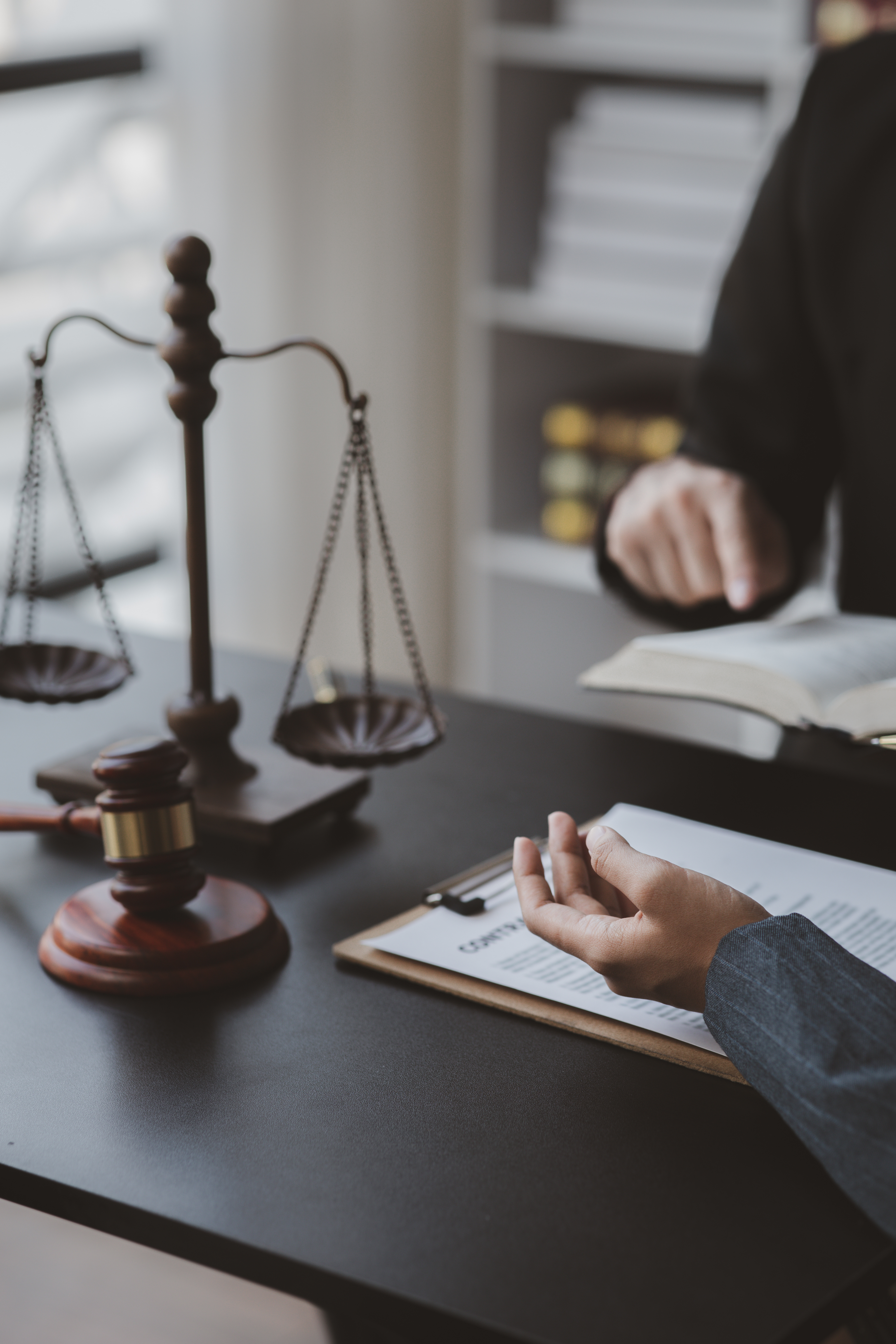 An attorney talking to their client in Palm Beach County.