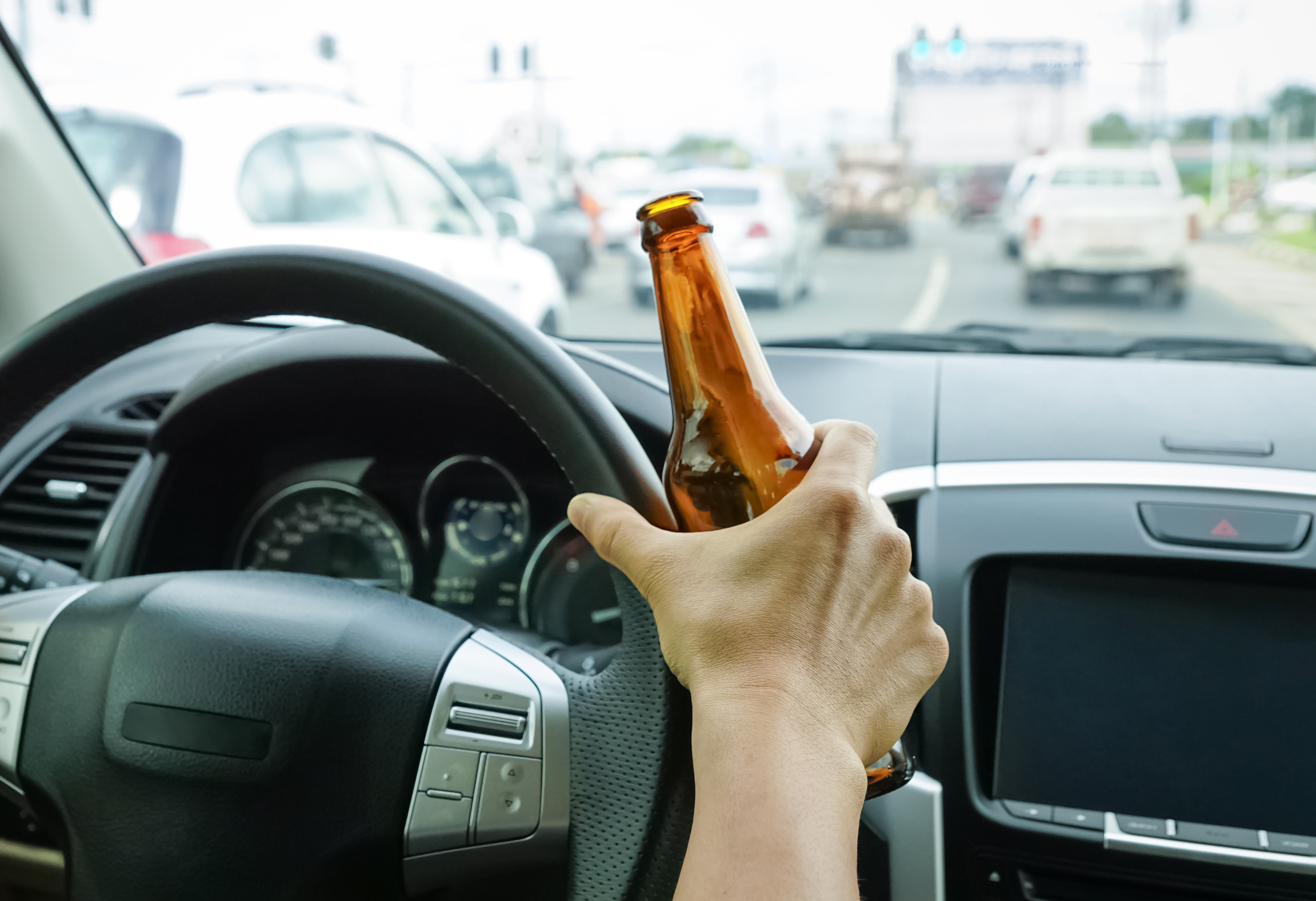 A person driving under the influence - if you need help navigating Florida's new breathalyzer laws after a traffic stop, contact Peterford Law.